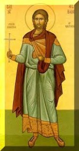 St Alban stylised as late Roman dress with his cross